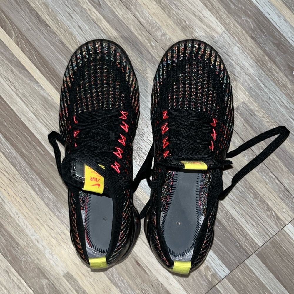Nike Women’s Black Multicolor Flyknit Sneakers with Yellow Accents